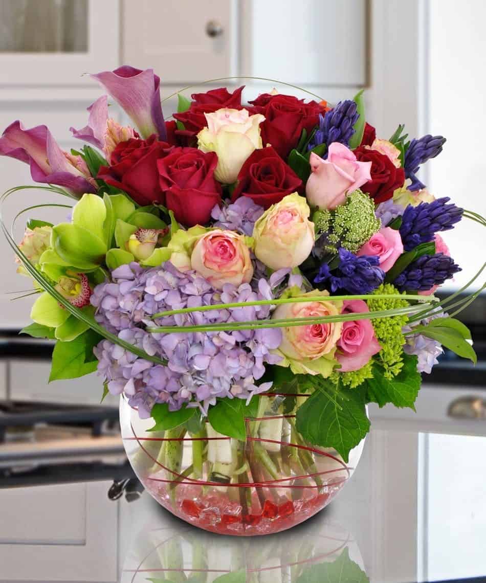 this magnificent bouquet is unmatched by any other. Boasting only the most premium of floral varieties, such as Roses, Hydrangea, Cymbidium Orchids, Miniature Calla Lilies, and much more,